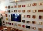 I turned a cigar box collection into a gallery wall! I also installed that flat screen.