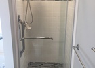 New shower door and accent tiles really brought back a dated shower
